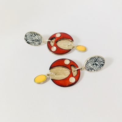 Vitreous enamel set and riveted in silver 